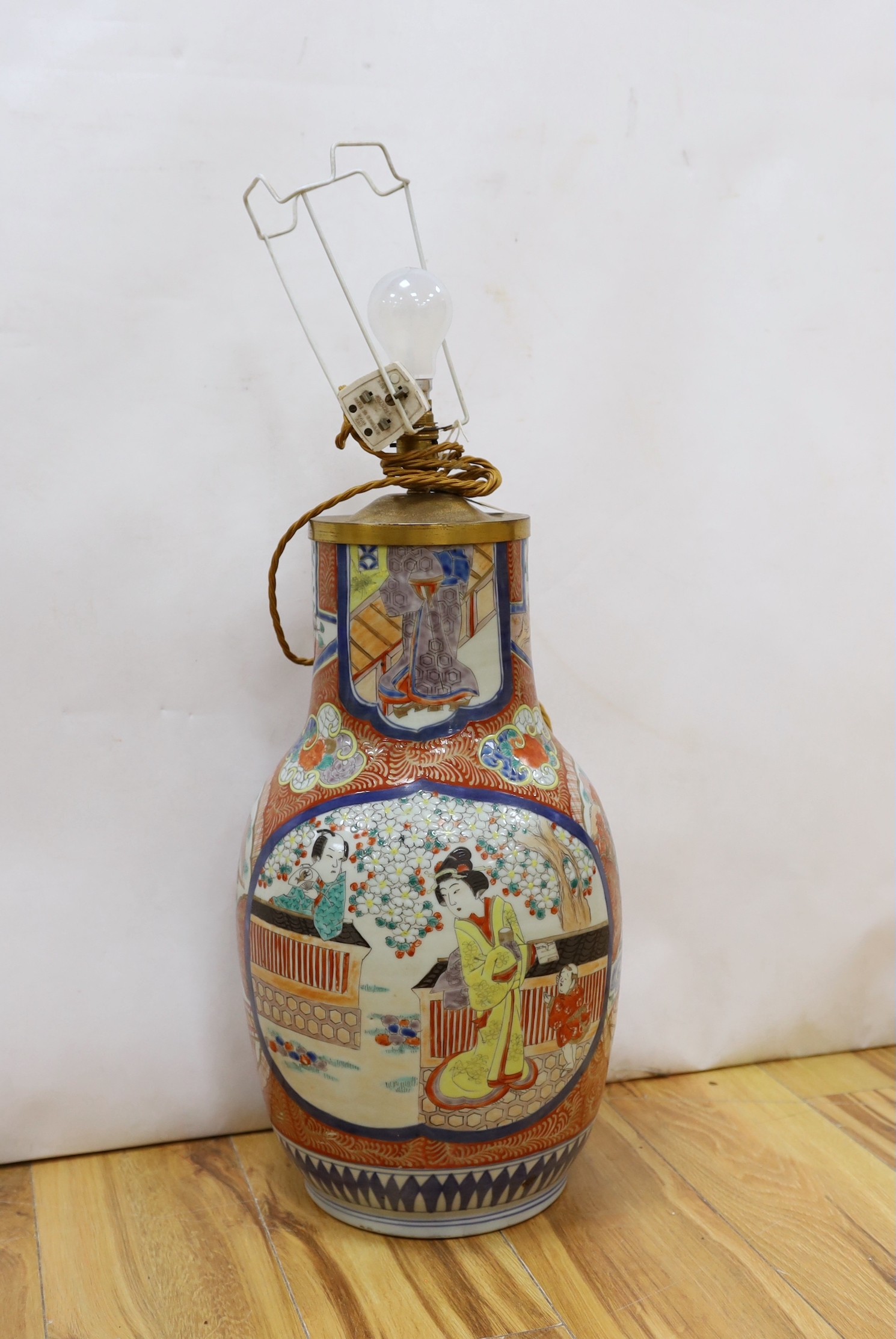 A Japanese Kutani vase, painted with figures (cut down and fitted as a table lamp), total height 57cm